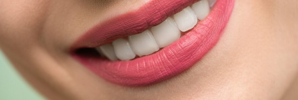 Woman smiling with red lipstick