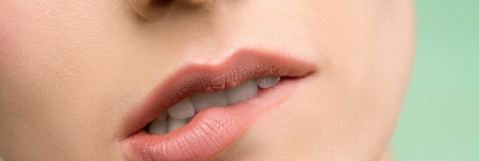 Woman biting her lip