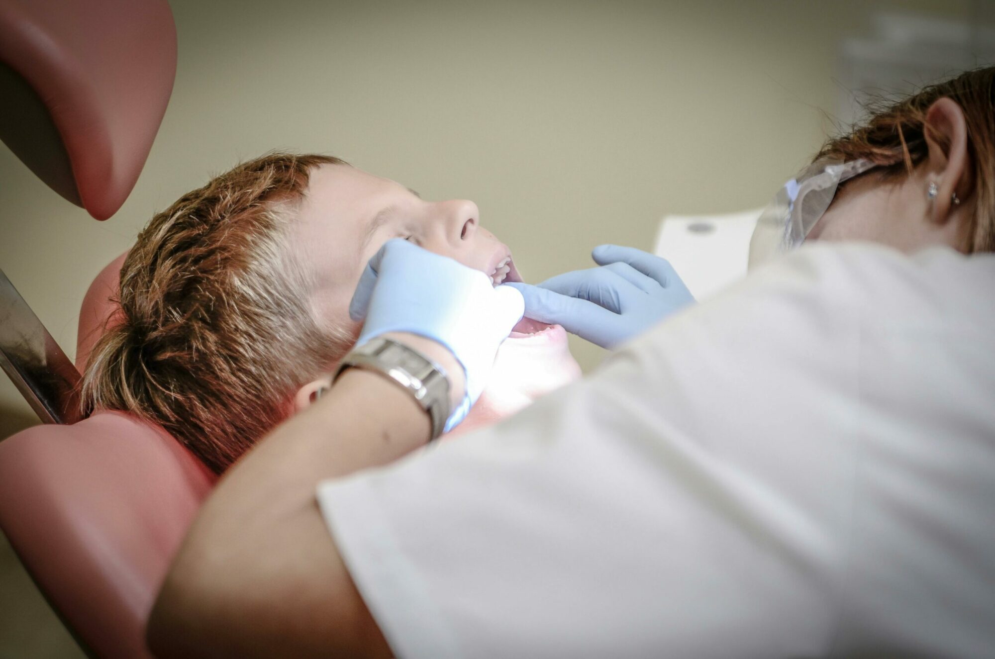 Child receiving a dental examination.