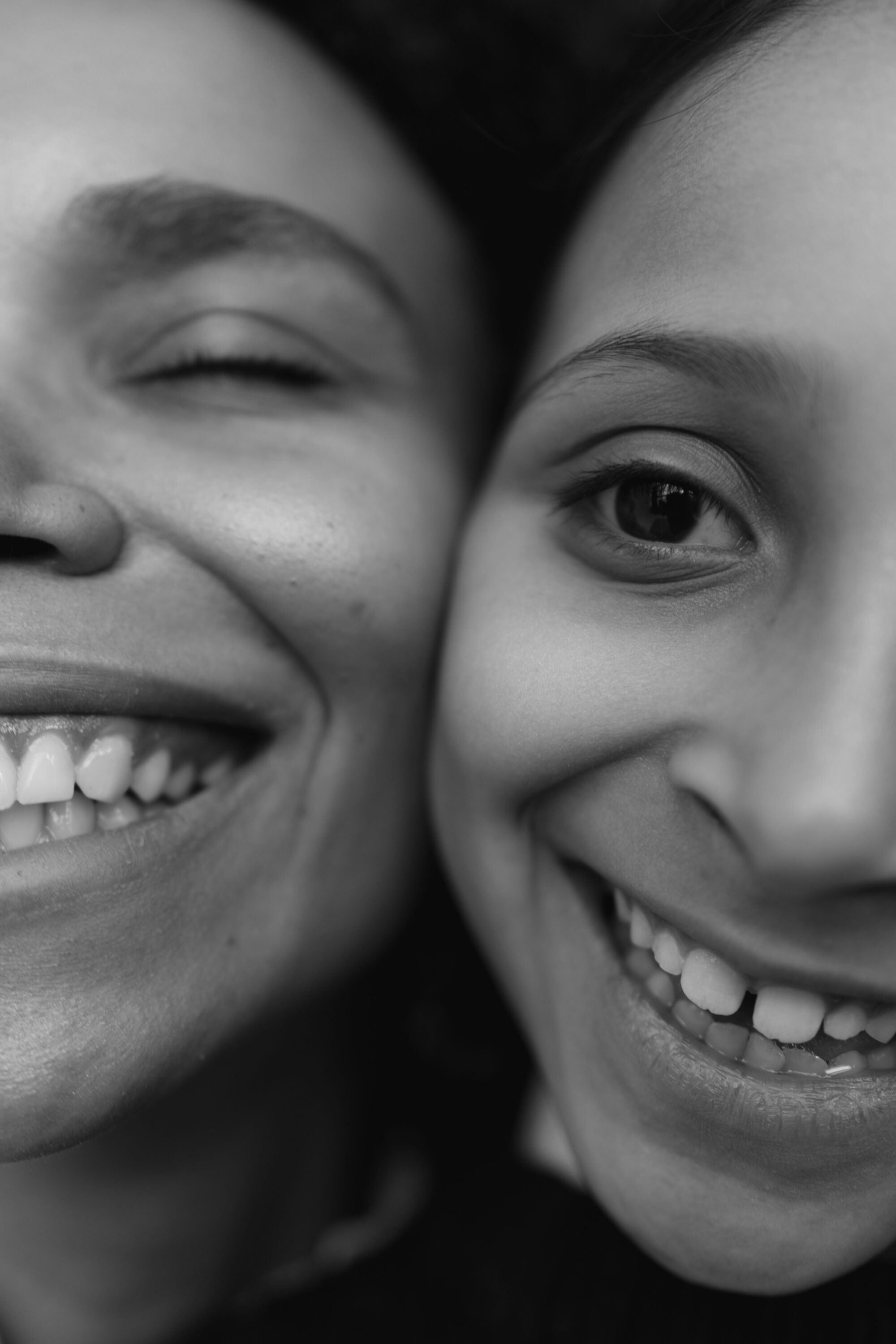Mother and Daughter smiling together